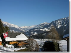 Moonrise over the village of Leysin in the Vaudoise Alps