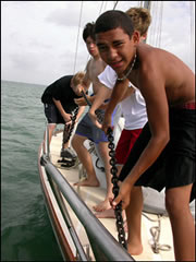 In the interests of full disclosure: those swabbies in the photograph aren't actually bumming a free ride; they're guys from my scout troop, and we're sailing the Florida Keys, not the Med.