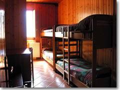 A room in the Rifugio Orestano (www.rifugiorestano.com), a mountain refuge built in the 1920s on the Piano Zucchi (3646 feet above sea level) in Sicily's Parco delle Madonie.