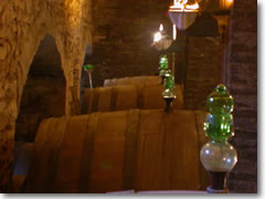 Giant casks with glass baubles aging Vino Nobile di Montepulciano in the Cantina de Redi cellars.